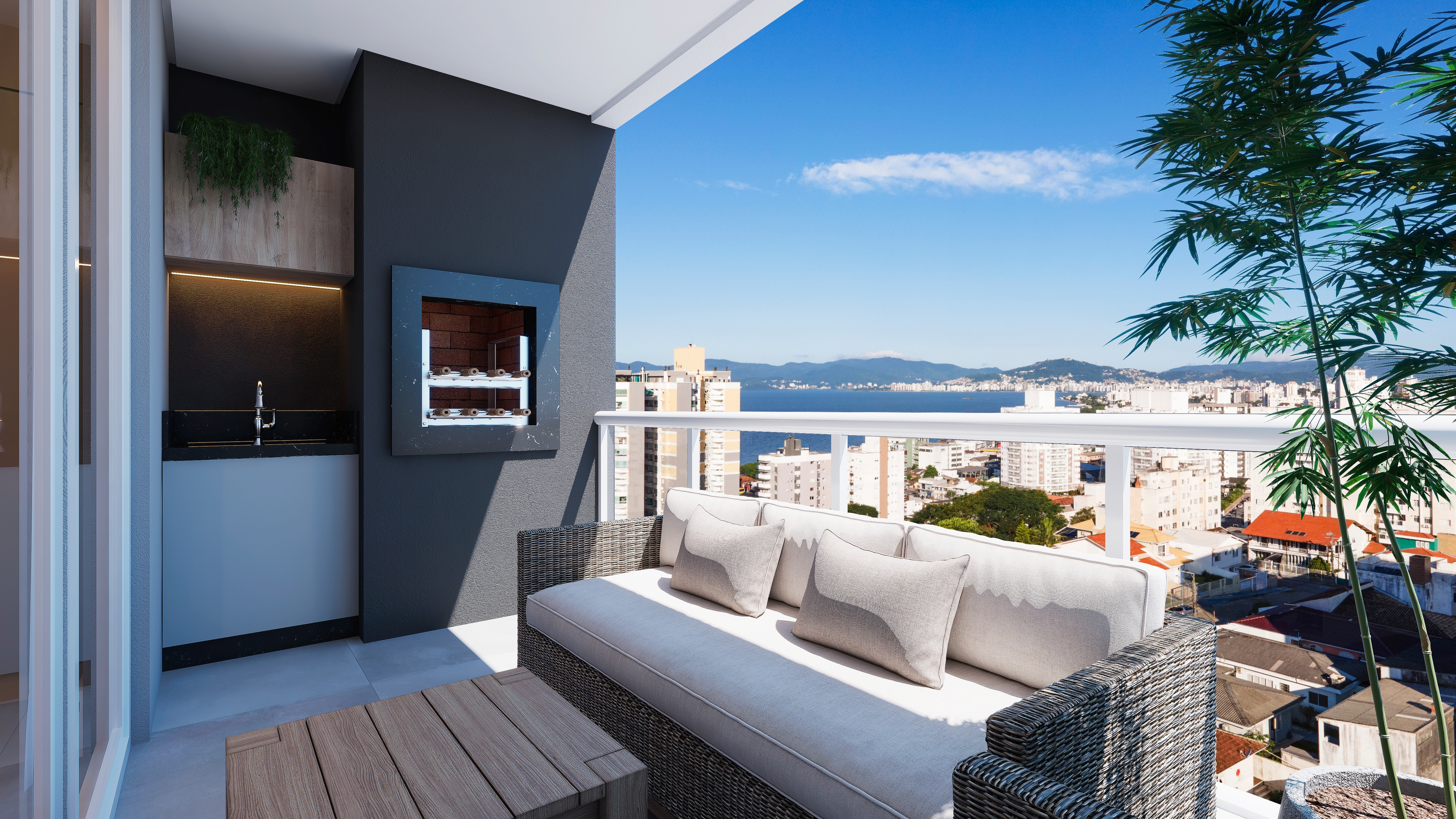 Vista de uma sacada com móveis de área externa e uma paisagem urbana ao fundo