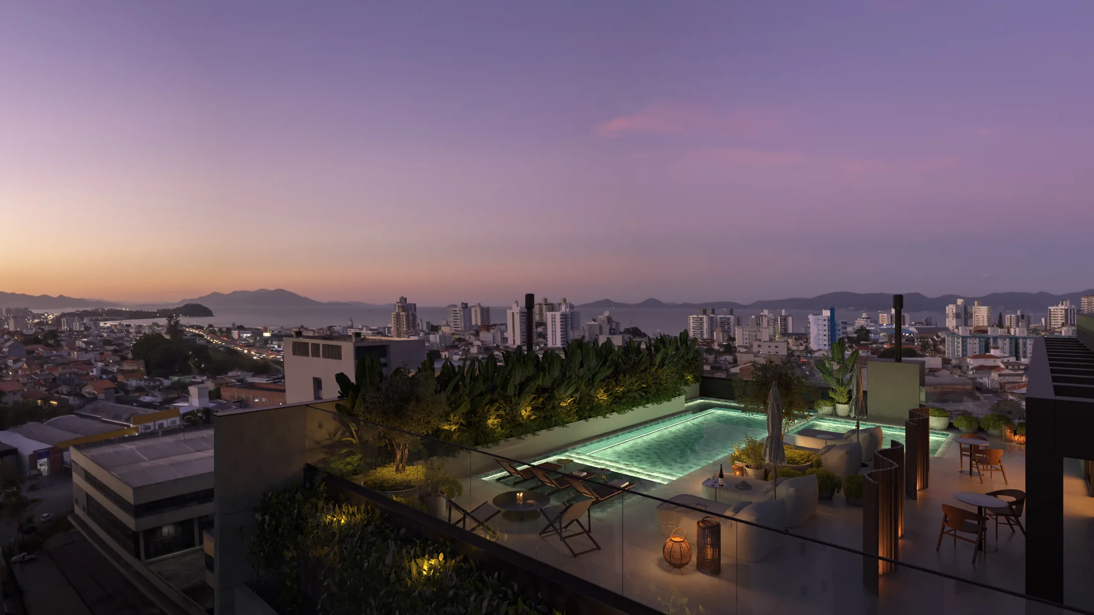 Piscinas do Essenza ao entardecer com vista para a cidade
